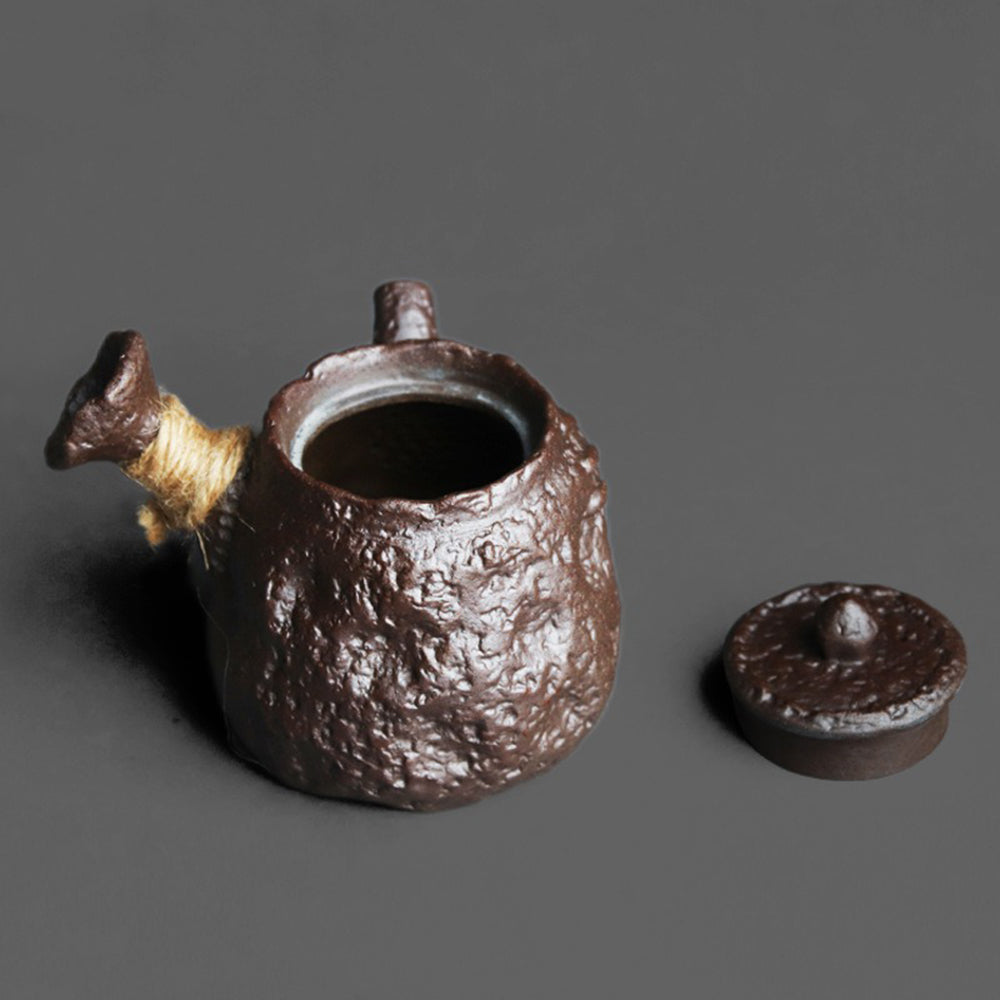 Japanese Kyusu stone texture teapot with side handle and textured clay surface for authentic tea brewing