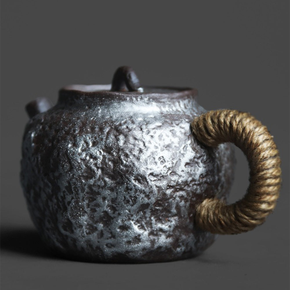 Close-up of the handmade Japanese ceramic teapot highlighting its coarse clay surface