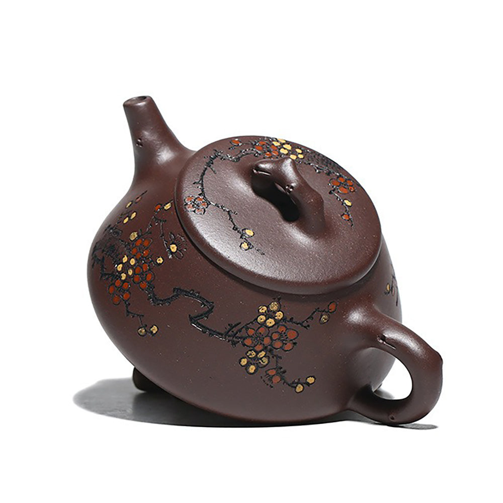 Close-up of the teapot spout designed for a smooth pour, highlighting its artistic craftsmanship.