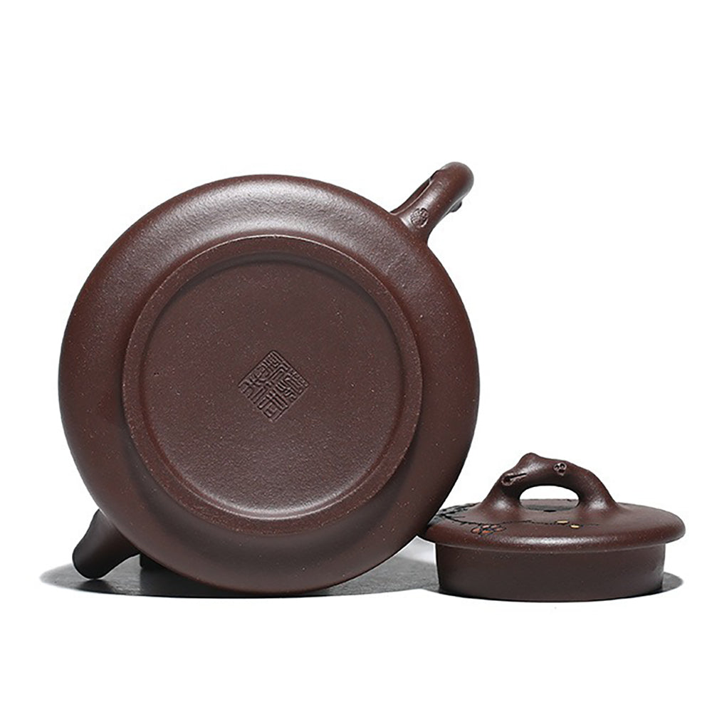 Close-up of the teapot spout designed for a smooth pour, highlighting its artistic craftsmanship.