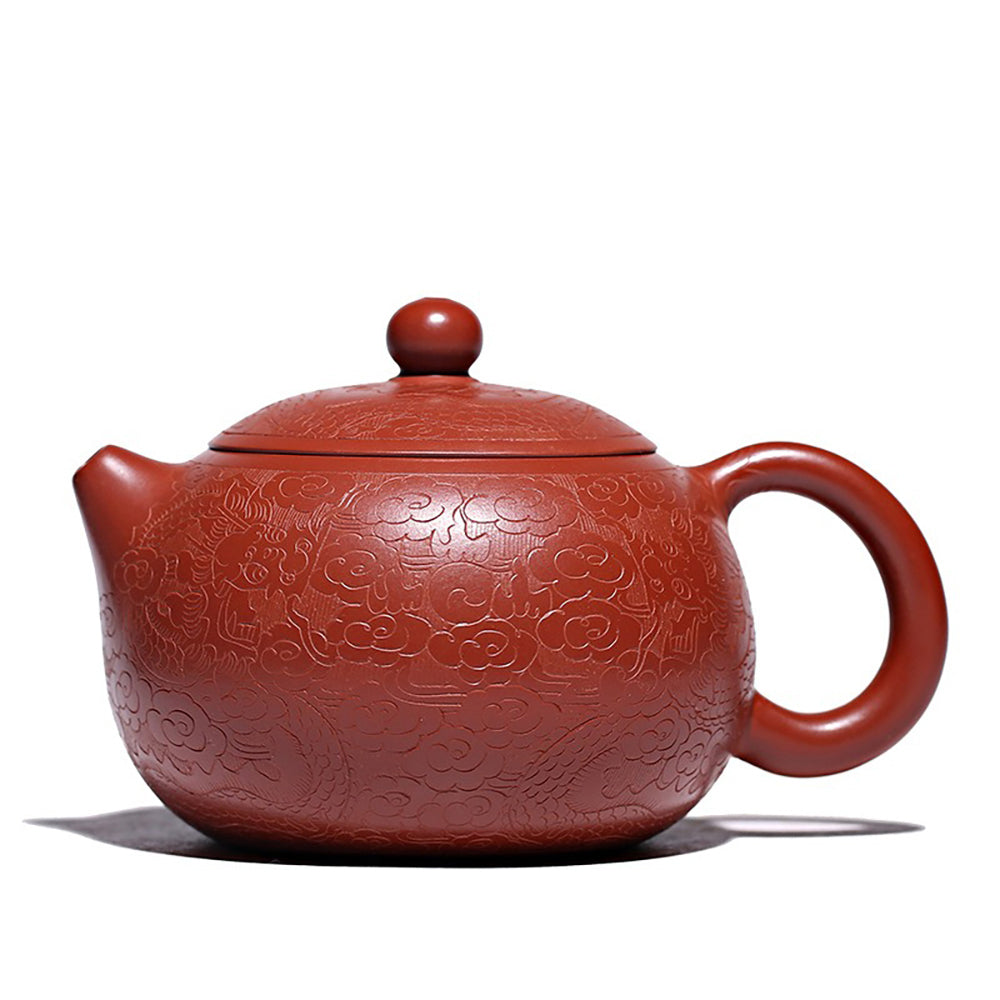 Dahongpao Yixing teapot showcasing intricate dragon designs from a side view.