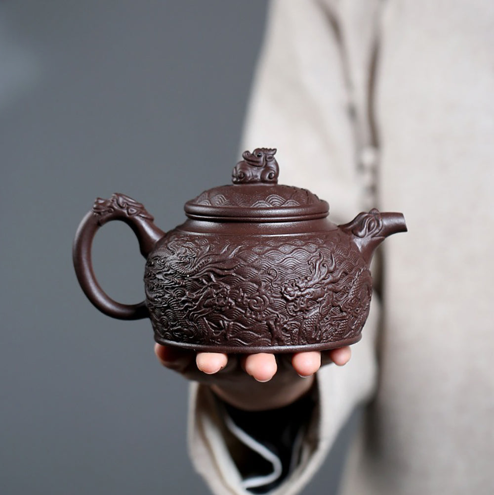 Side view of handcrafted dragon-shaped handle and spout on Yixing teapot