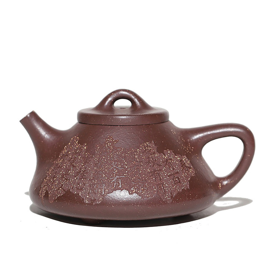 Close-up view of the artisan Yixing purple clay teapot highlighting its elegant curves and intricate details.