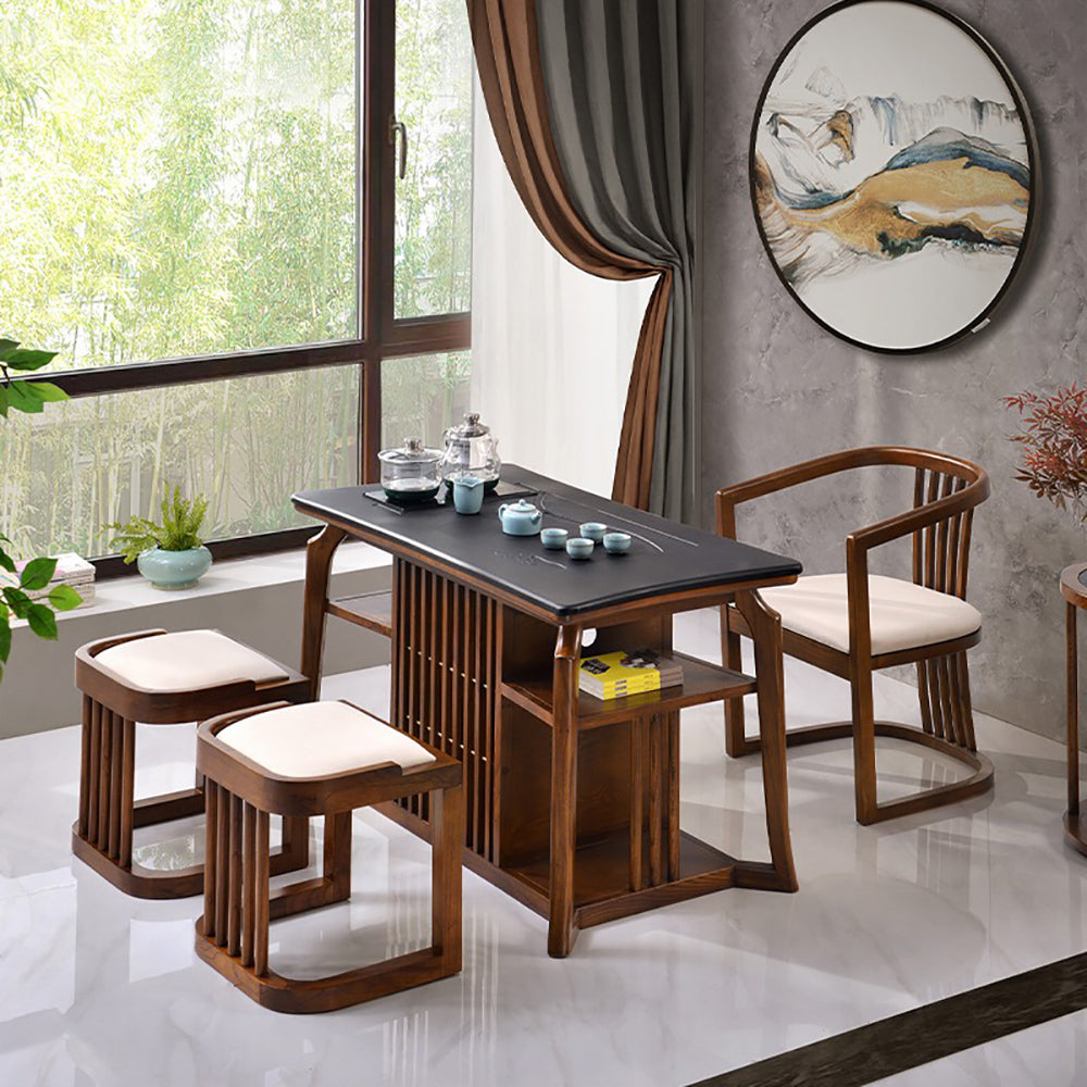 Close-up of the stone tabletop on a wooden tea table, highlighting its smooth, lustrous surface