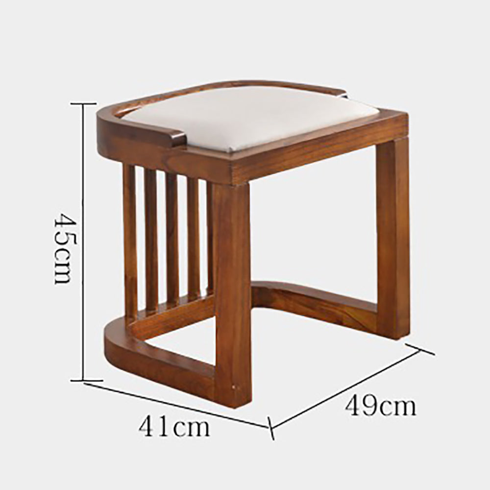Close-up of the stone tabletop on a wooden tea table, highlighting its smooth, lustrous surface