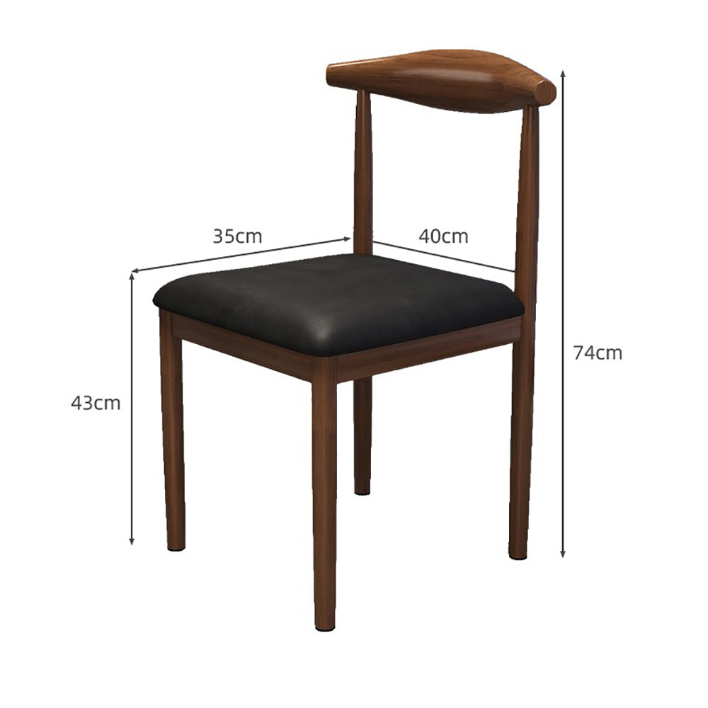 Angled view of the steel-wood tea table with chairs, showcasing walnut finish and sturdy frame