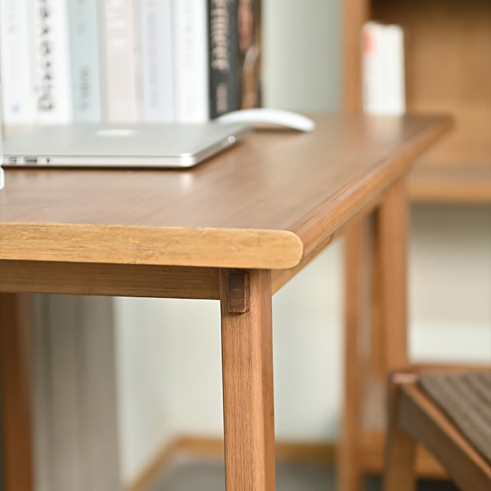 Elegant bamboo tea table set with three chairs, showing its modern design