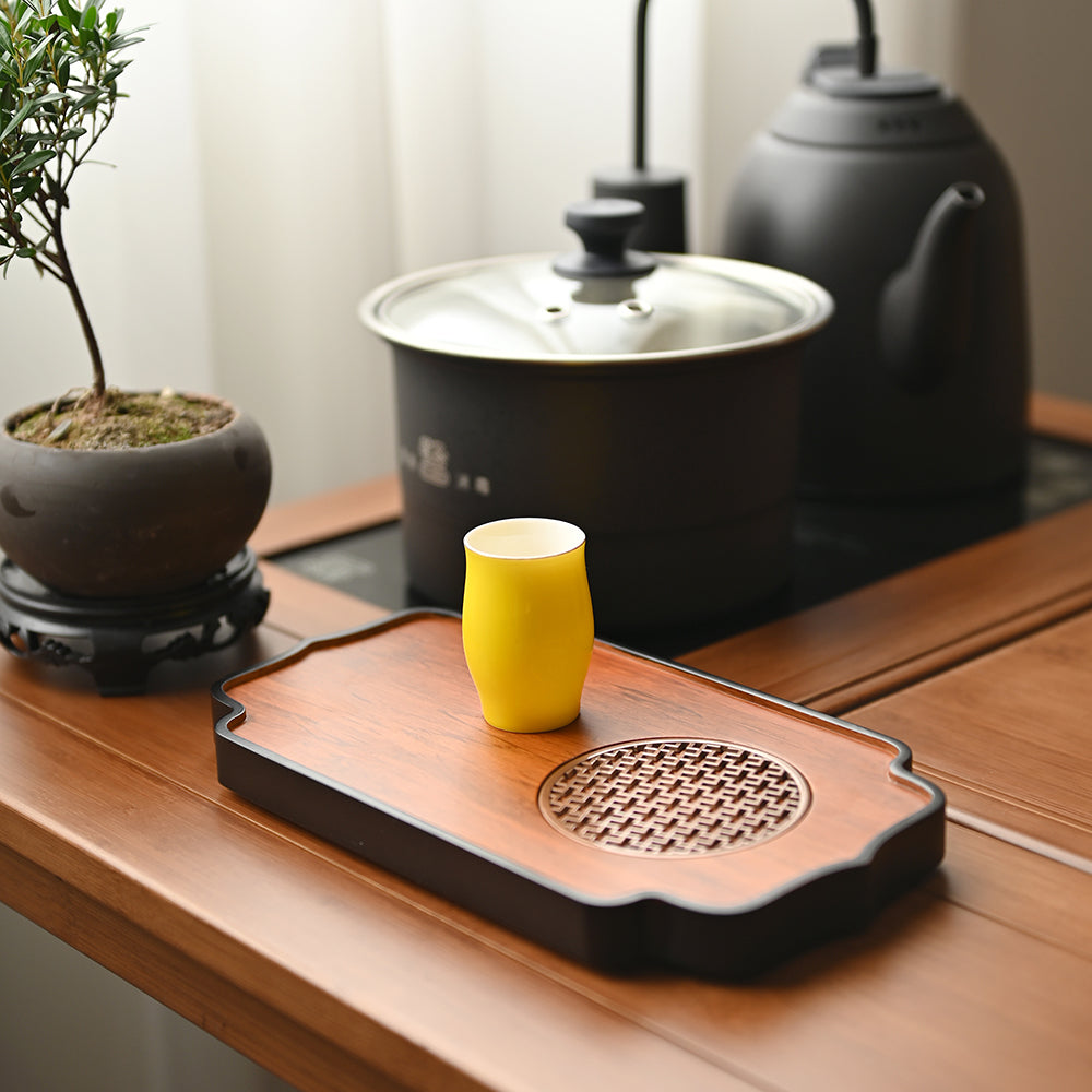 Stylish bamboo tray with tea utensils for home use