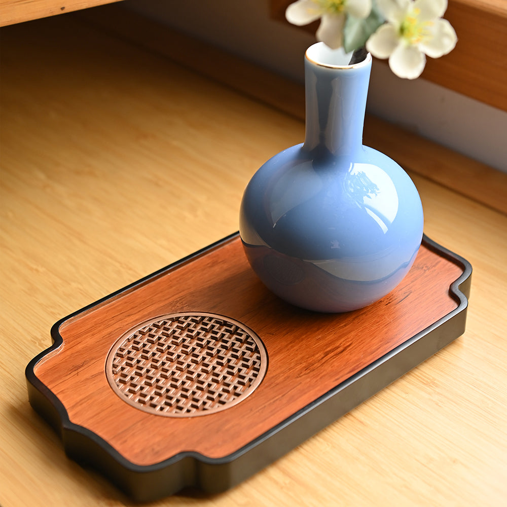 Stylish bamboo tray with tea utensils for home use