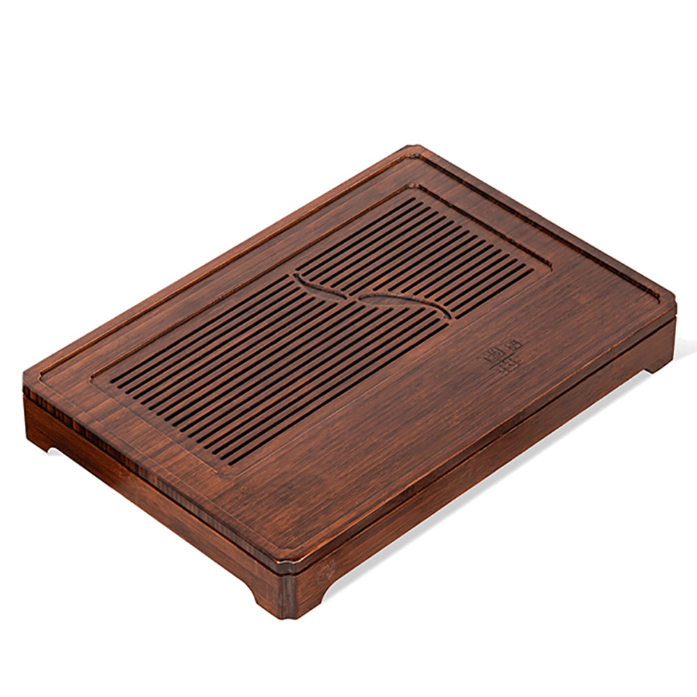 Eco-friendly bamboo tea tray showcasing dual fish design from above.