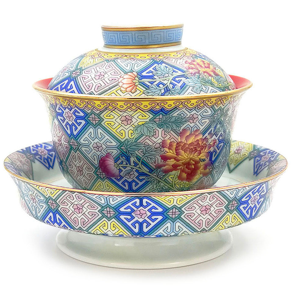 Elegant porcelain Gaiwan with peony flower design, ideal for tea preparation