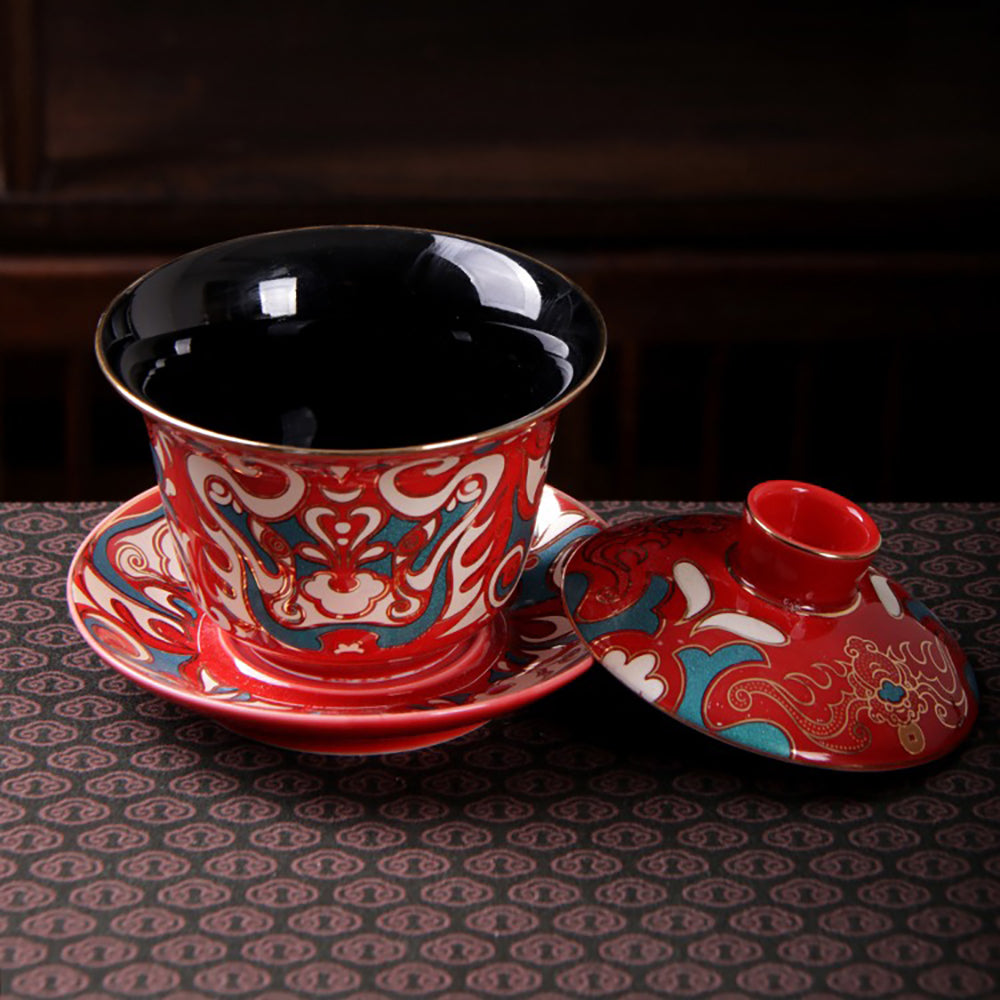 Lianpu Gaiwan tea set showcasing Peking Opera mask artistry from a side view.