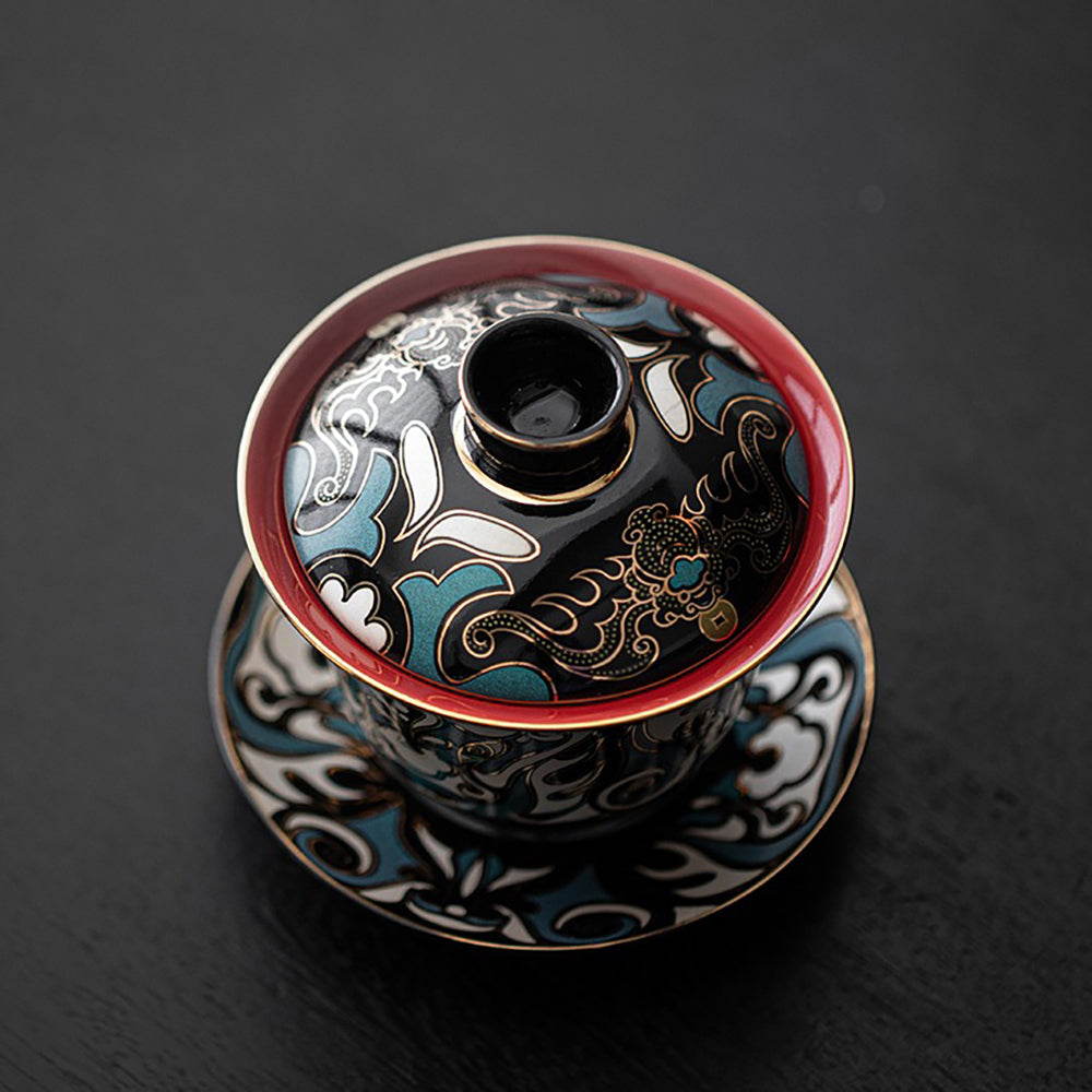 Lianpu Gaiwan tea set showcasing Peking Opera mask artistry from a side view.
