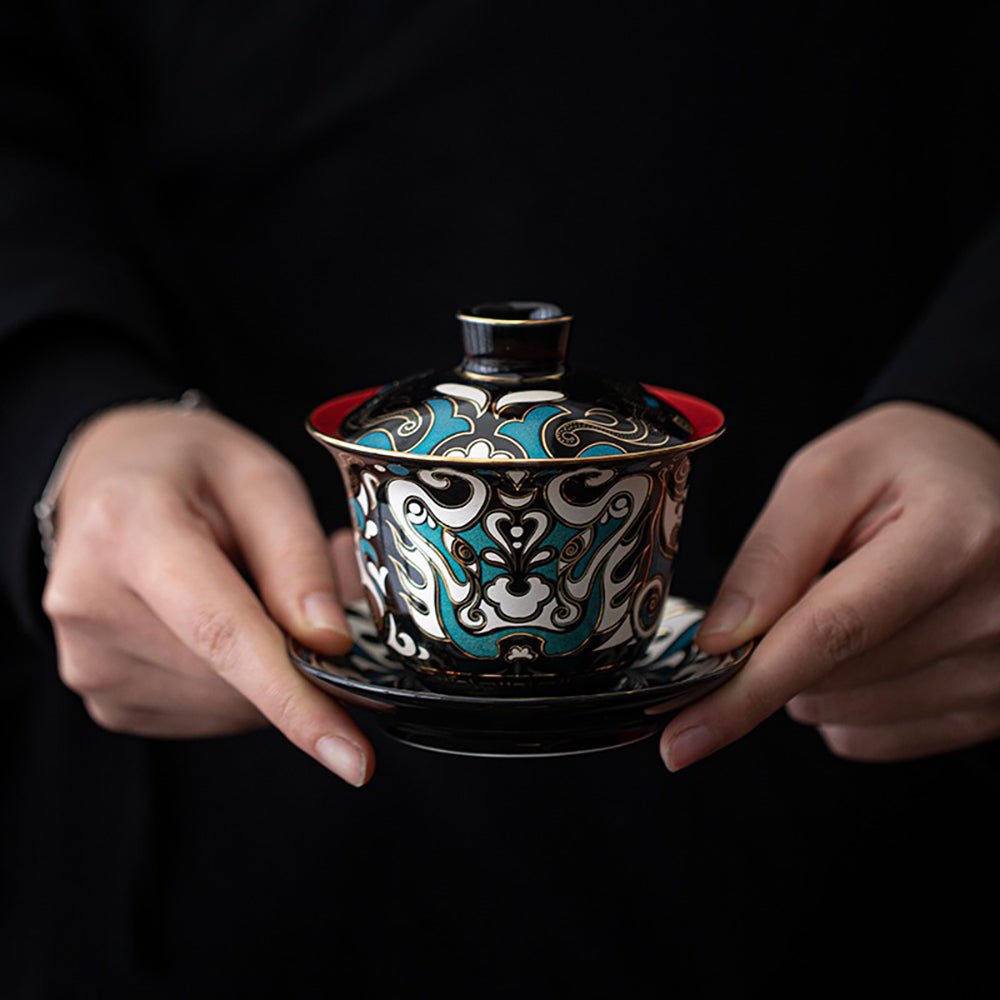 Lianpu Porcelain Gaiwan displayed with traditional Chinese tea utensils.