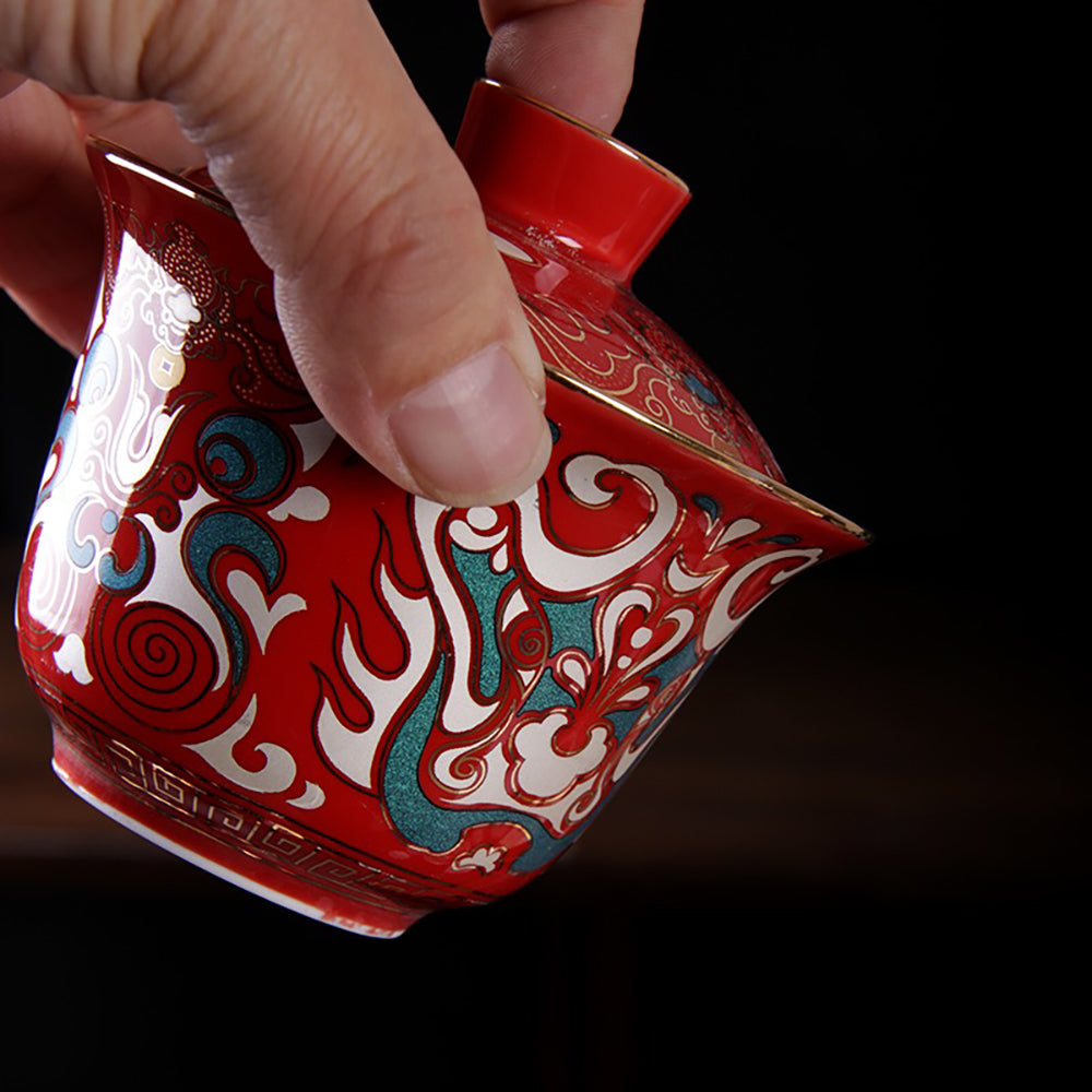 Close-up of the gold and silver inlay details on the Lianpu Gaiwan tea set.