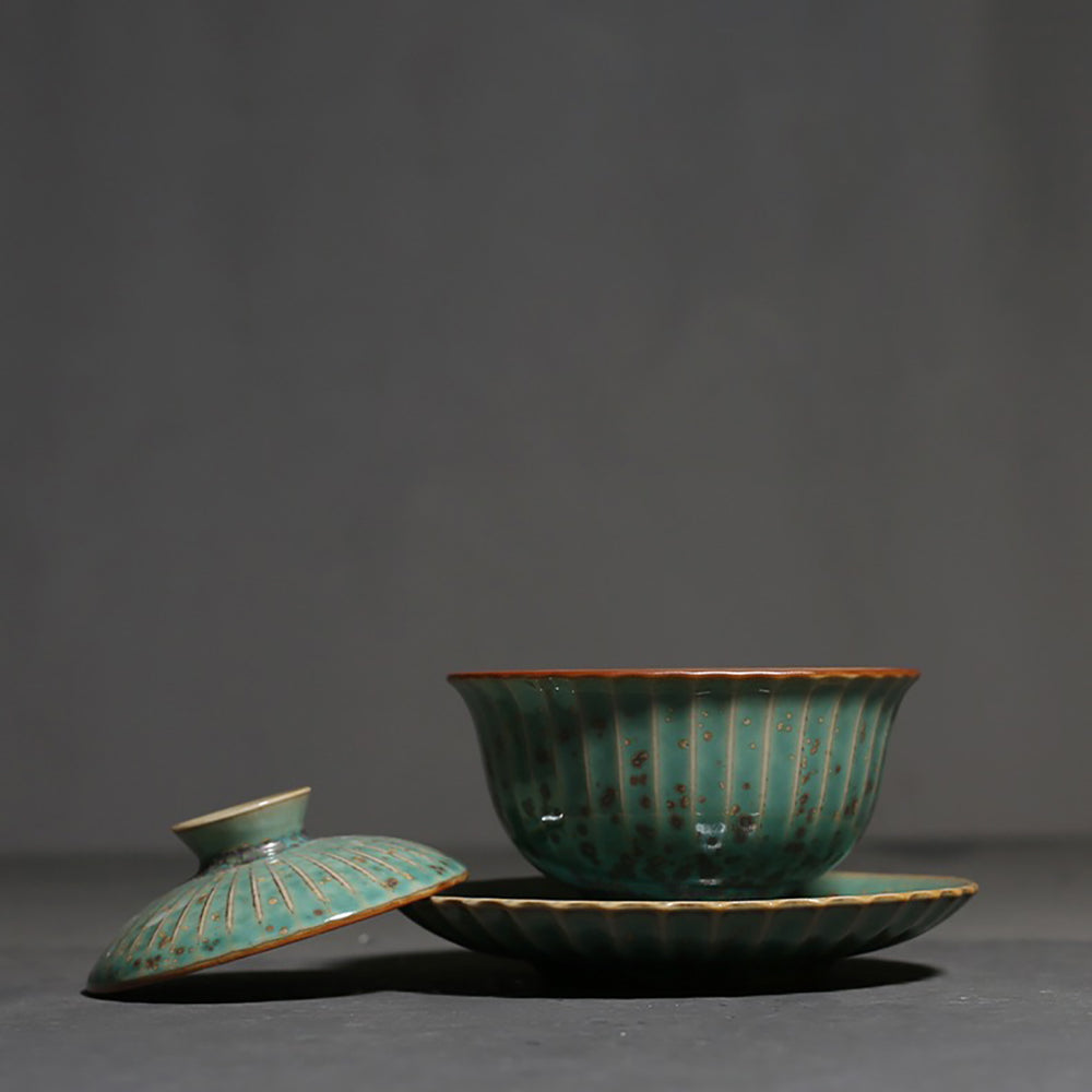 Petal-shaped Japanese gaiwan with kiln-transformed glaze showcasing crystalline patterns
