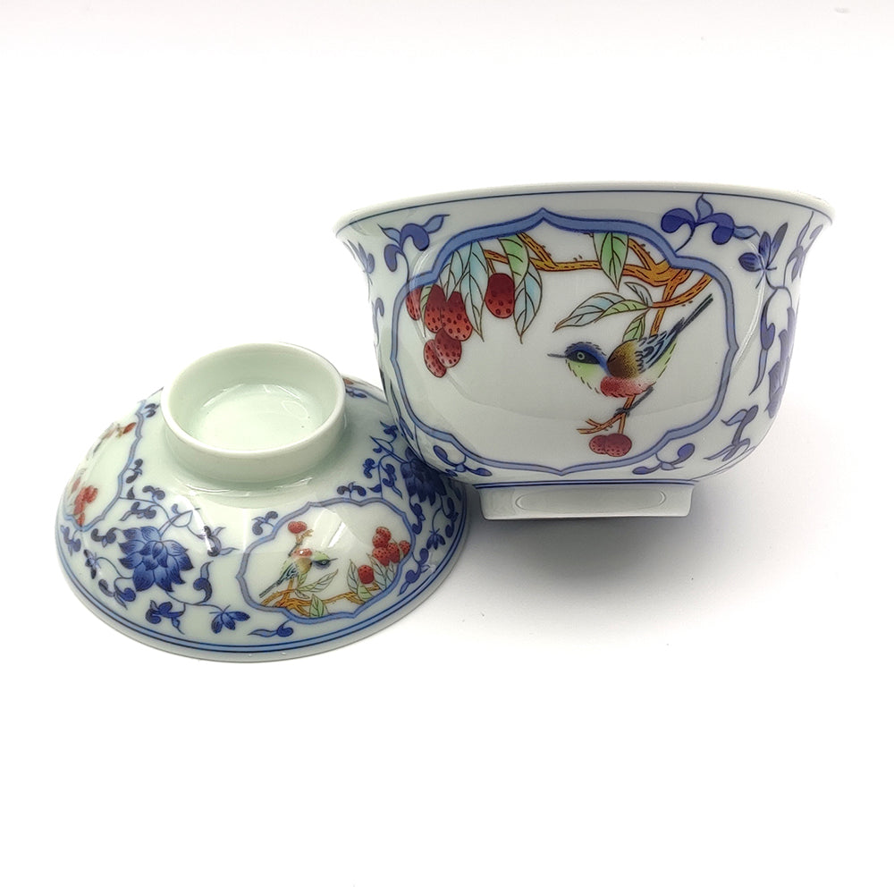 Magpie Lychee Gaiwan with vibrant blue and white porcelain design, perfect for tea lovers.