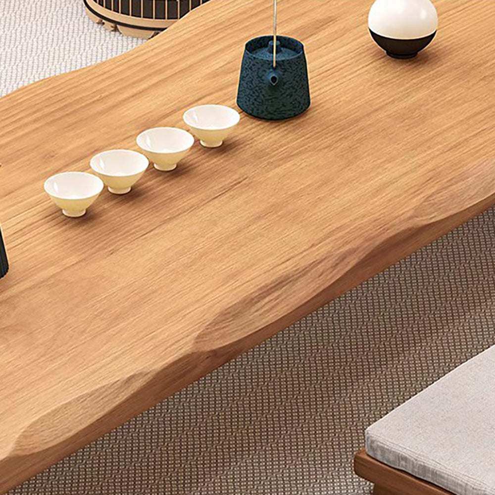 Elegant pine wood tea table set styled in a modern living room.