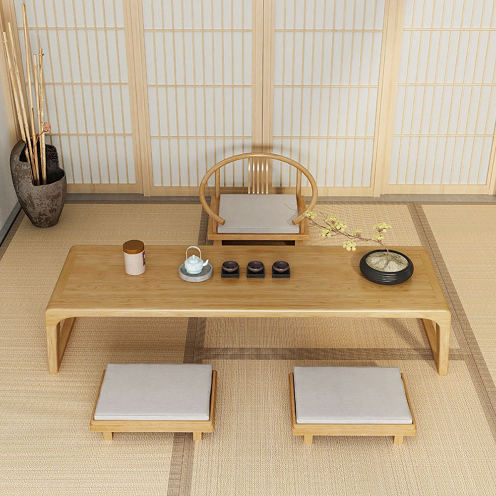 Living room setup featuring a handcrafted Japanese tea table with tatami mats
