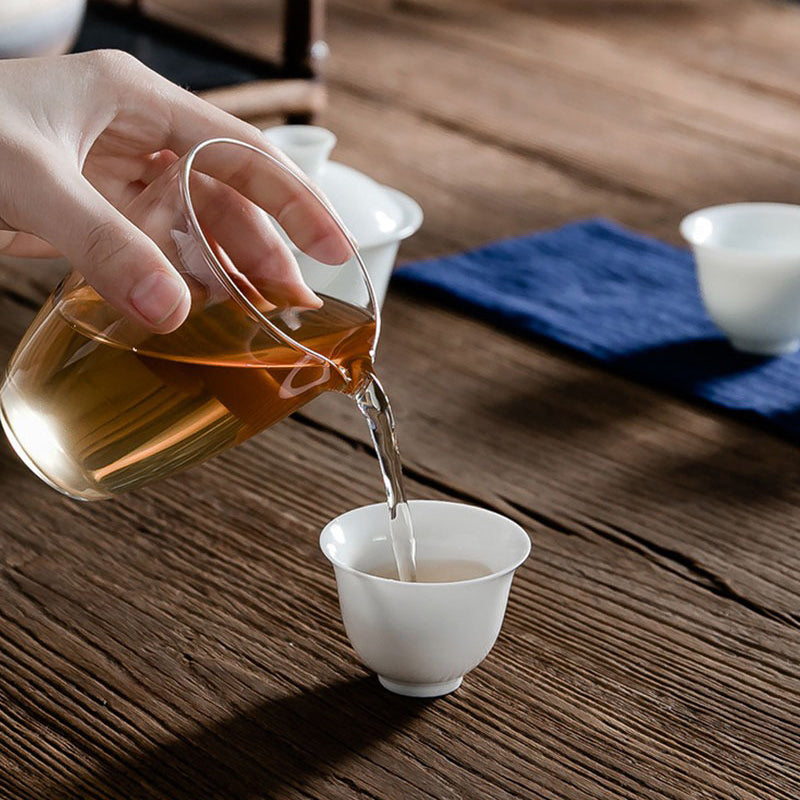 Complete travel tea set displayed with carrying bag and accessories
