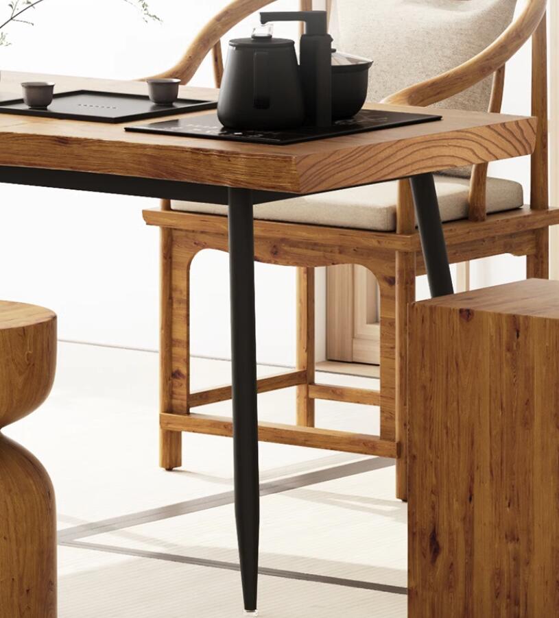 Set of five chairs around a Chinese tea table in a serene courtyard