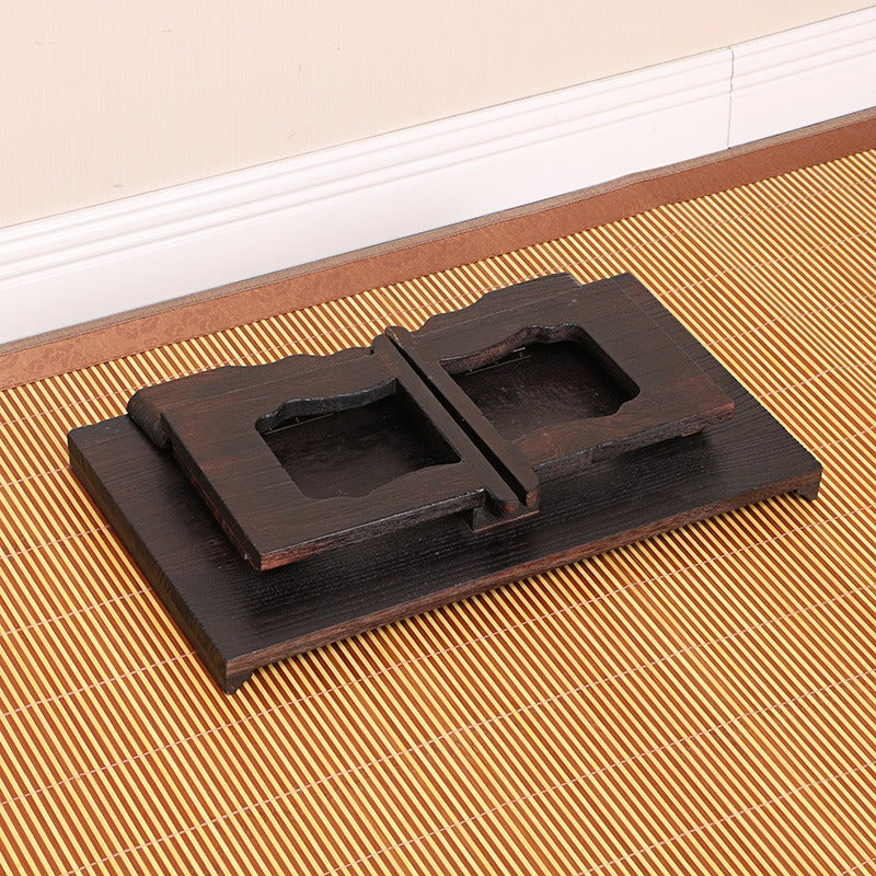 Tea ceremony setup on the ZenCraft table, highlighting its traditional Chinese design and stability