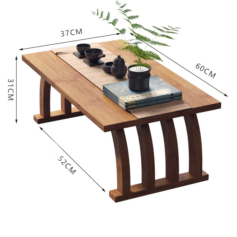 Bamboo arched tea table showcasing its elegant curves and structure in a modern living room setup.