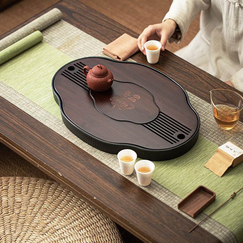 Black-brown bamboo tea tray with carved 福 character for elegant tea serving