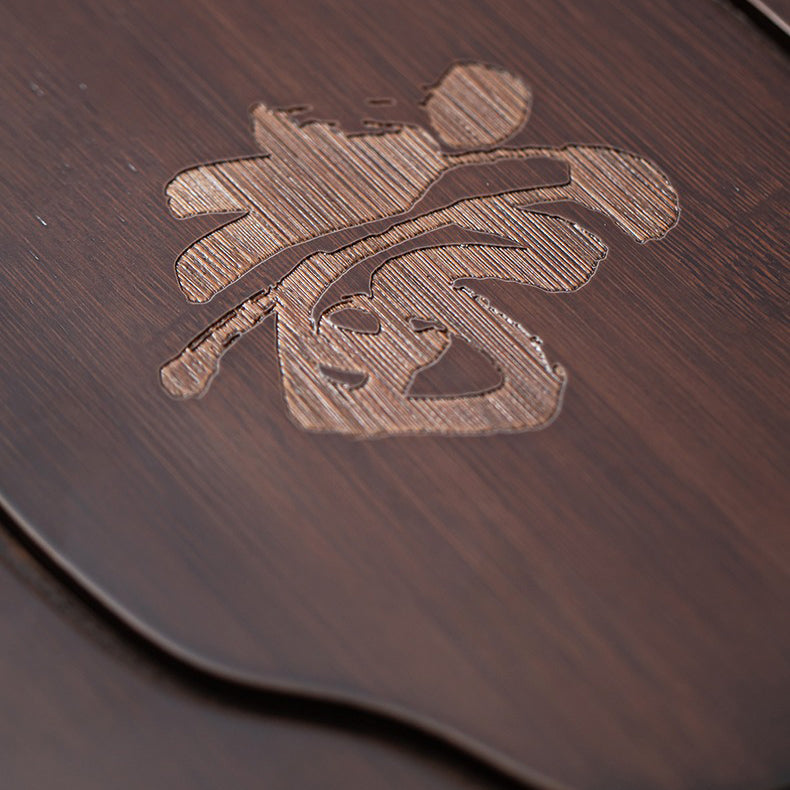 Black-brown bamboo tea tray with carved 福 character for elegant tea serving