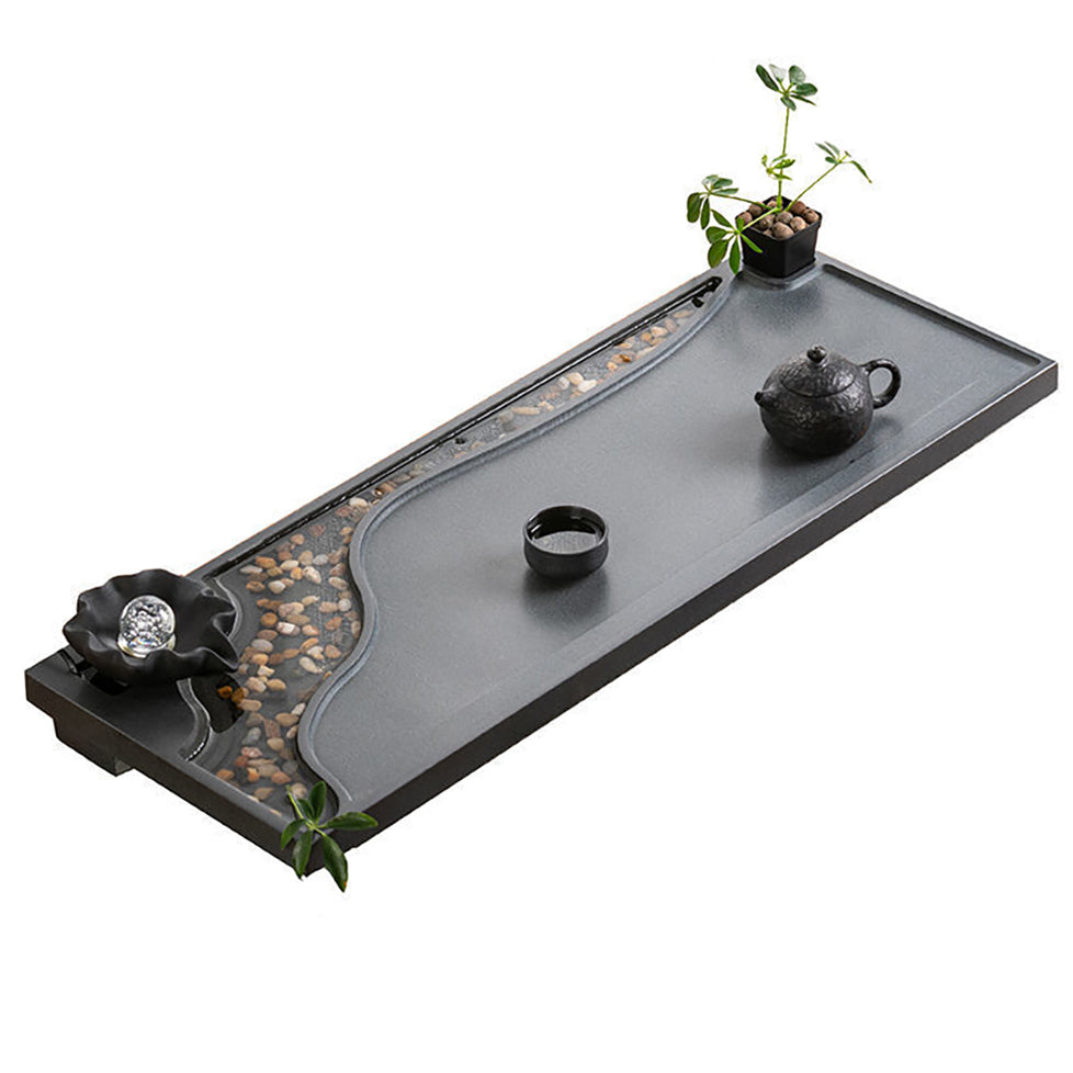 Top view of the stone tea tray showing waterflow feature and rolling sphere