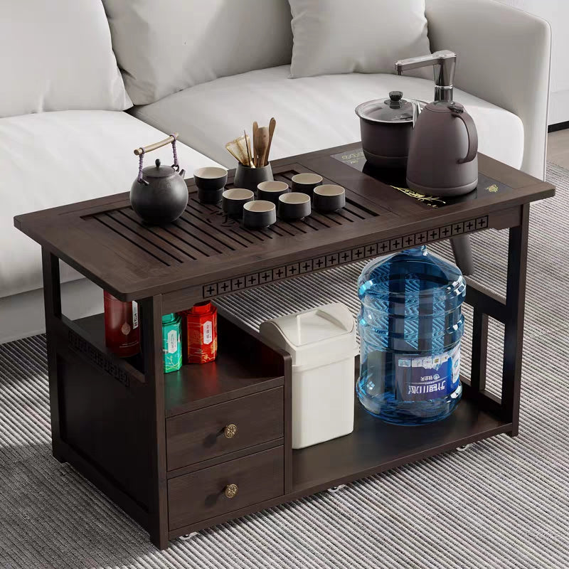 Elegant Chinese tea trolley on wheels made of nanmu wood, showcasing traditional craftsmanship