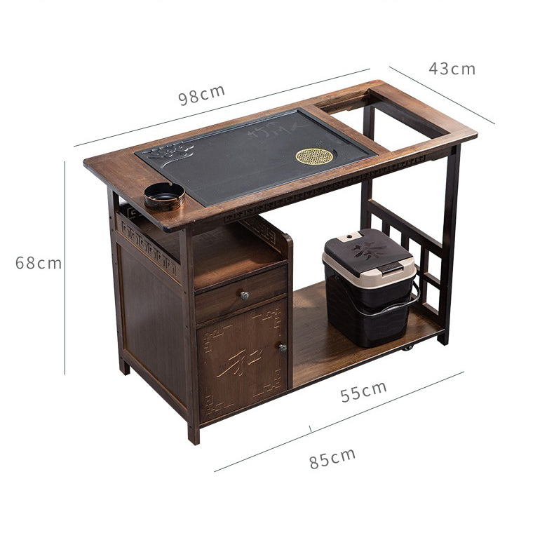 Elegant Chinese tea set displayed on the minimalist tea cart with stone tray