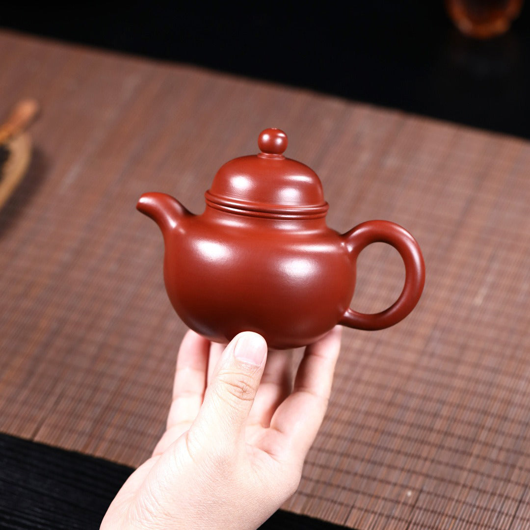 Close-up of the unique texture of the Yixing red clay teapot, emphasizing its high-quality material.