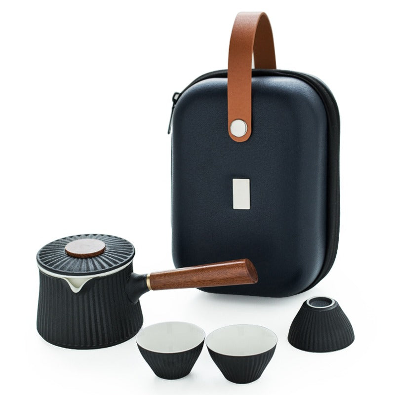 Close-up of the Japanese teapot with ergonomic handle, perfect for pouring tea.