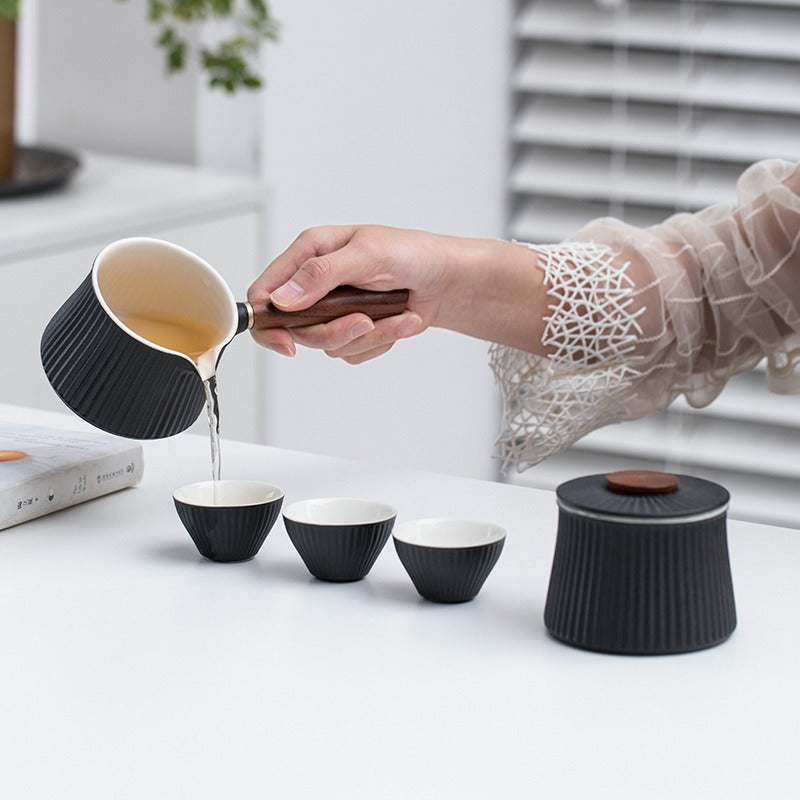 Close-up of the Japanese teapot with ergonomic handle, perfect for pouring tea.