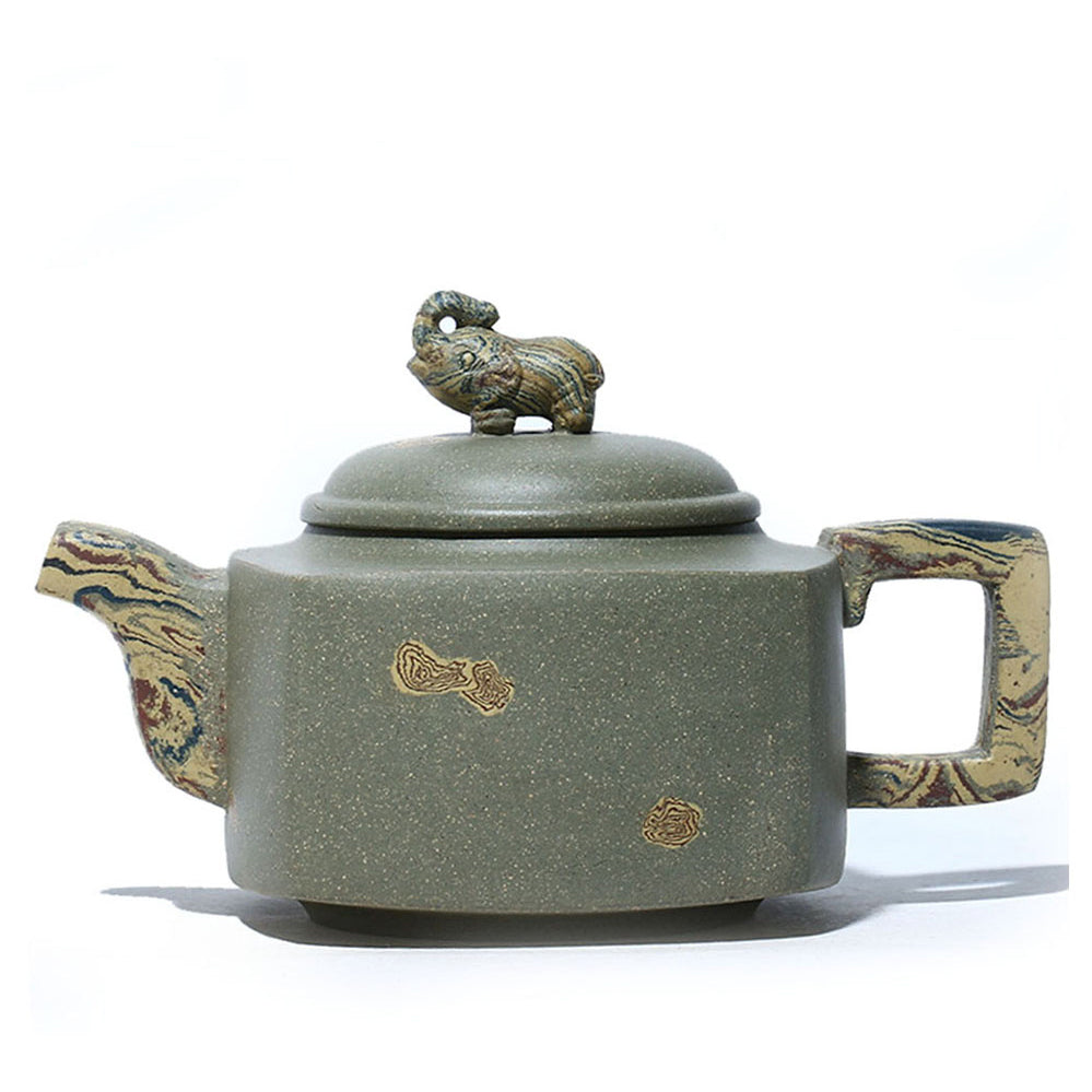 Close-up of Yixing green clay elephant teapot with detailed elephant lid button