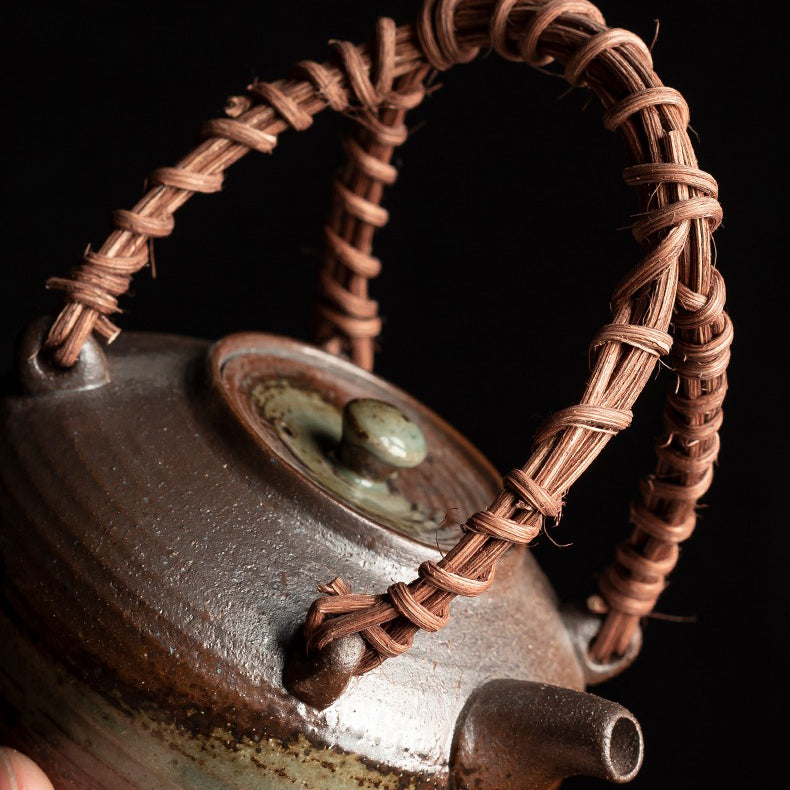Top view of the bamboo handle teapot, highlighting its exquisite craftsmanship and details.