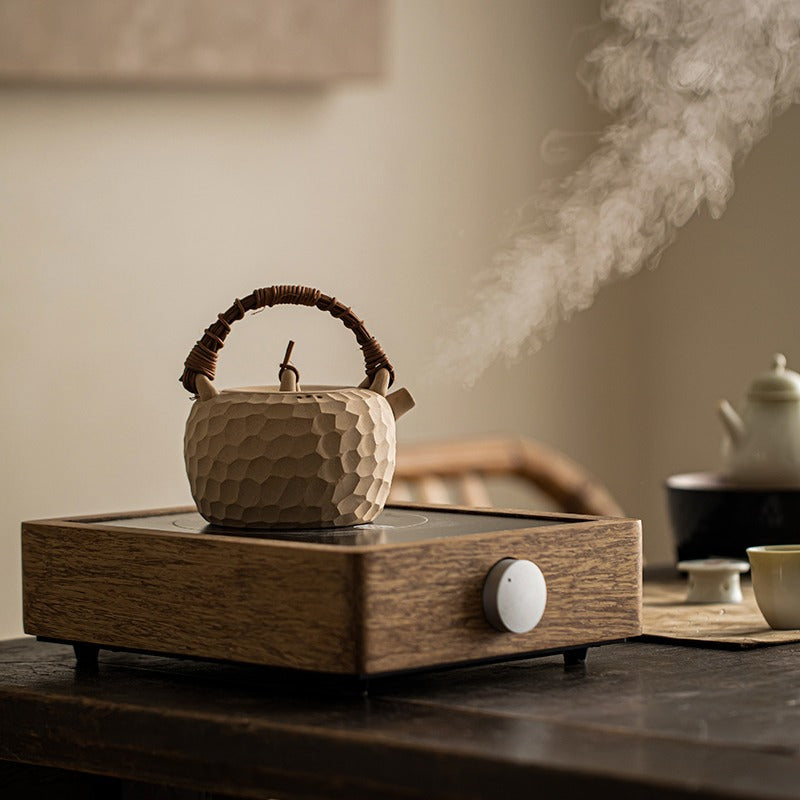 Japanese yellow clay heatable teapot with traditional design