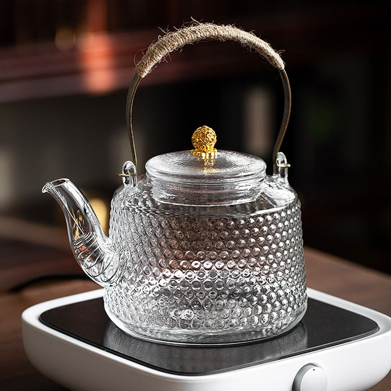 Rivet-Style Glass Teapot from a side angle showing the capacity and craftsmanship.