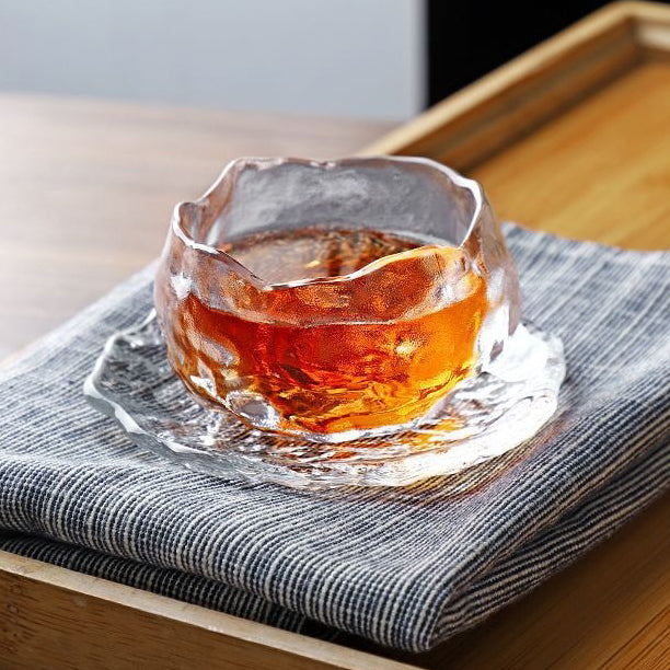 Aurora tea cup photographed mid-pour to showcase heat resistance and clarity.