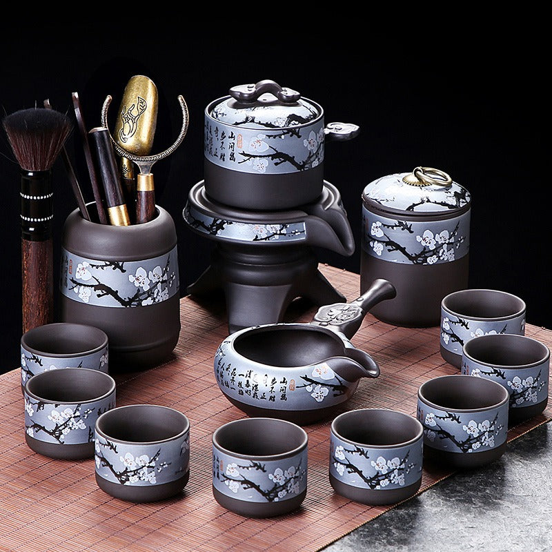 Set of eight tea cups and fair cup made from purple clay, perfect for home tea brewing