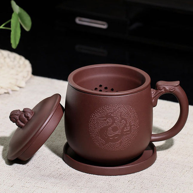 Yixing teaware with infuser, highlighting the elegant design and craftsmanship