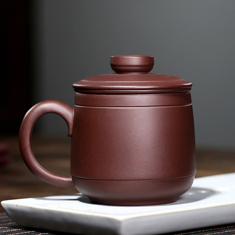 Tea infuser cup made from authentic Yixing clay, perfect for brewing loose teas