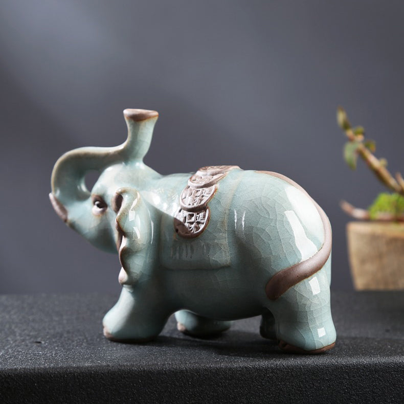 Close-up of the glossy surface of the Yao tea pet, highlighting its intricate details