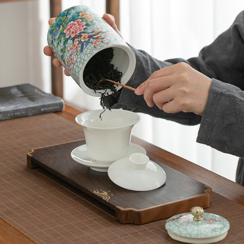 Tea caddy with loose leaf tea inside, highlighting airtight seal and stylish appearance
