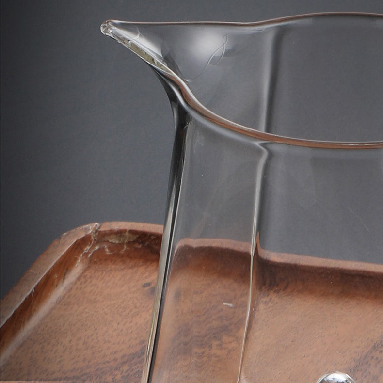Close-up of the large glass cup showing its capacity and sturdy handle