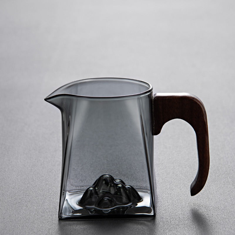 Decorative shot of the large glass tea cup filled with tea, highlighting its size and design