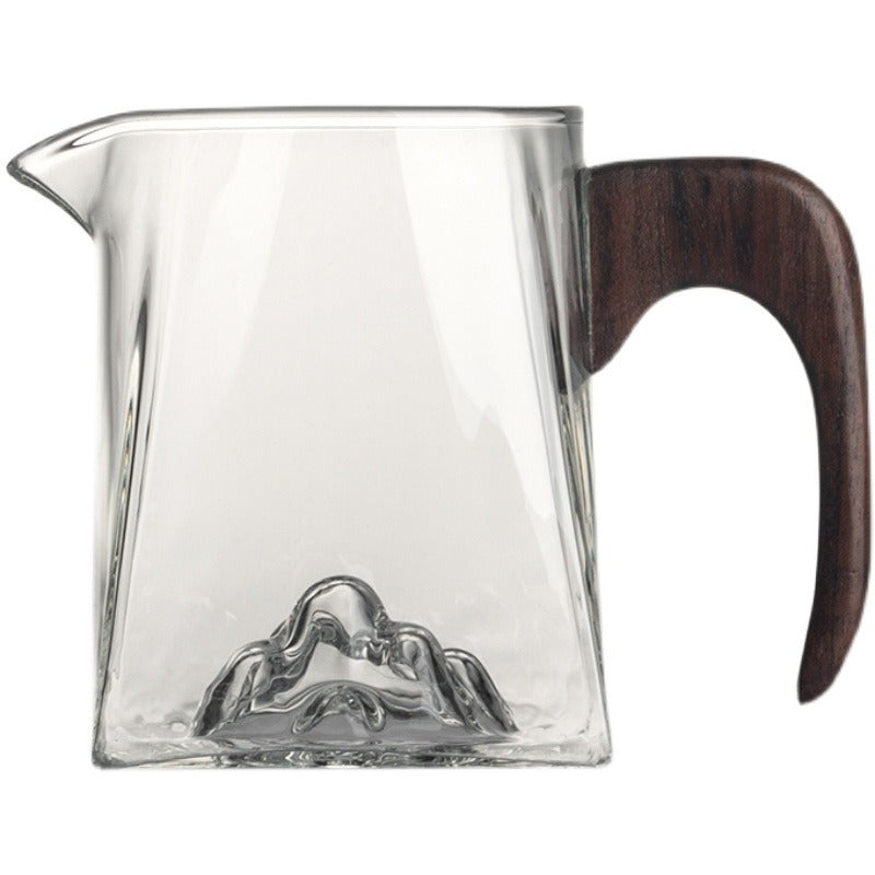 Decorative shot of the large glass tea cup filled with tea, highlighting its size and design
