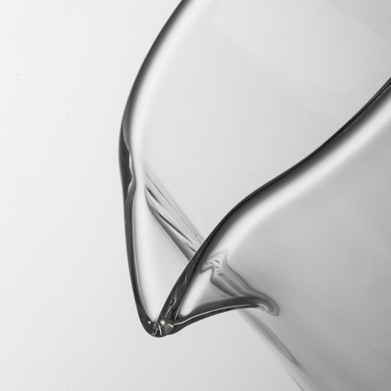 Decorative shot of the large glass tea cup filled with tea, highlighting its size and design