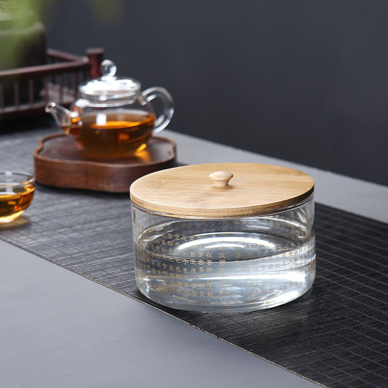 Tea brewing and cleaning set including the glass tea washer and cups.